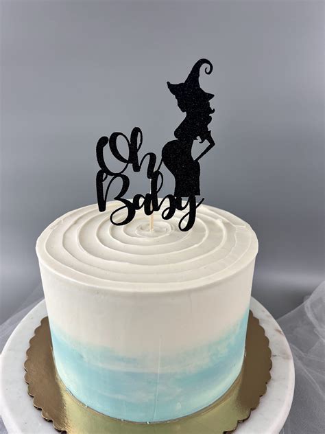 Ideas for Incorporating a Blessed with a Bump Witch Cake Topper into Your Baby Shower Decor
